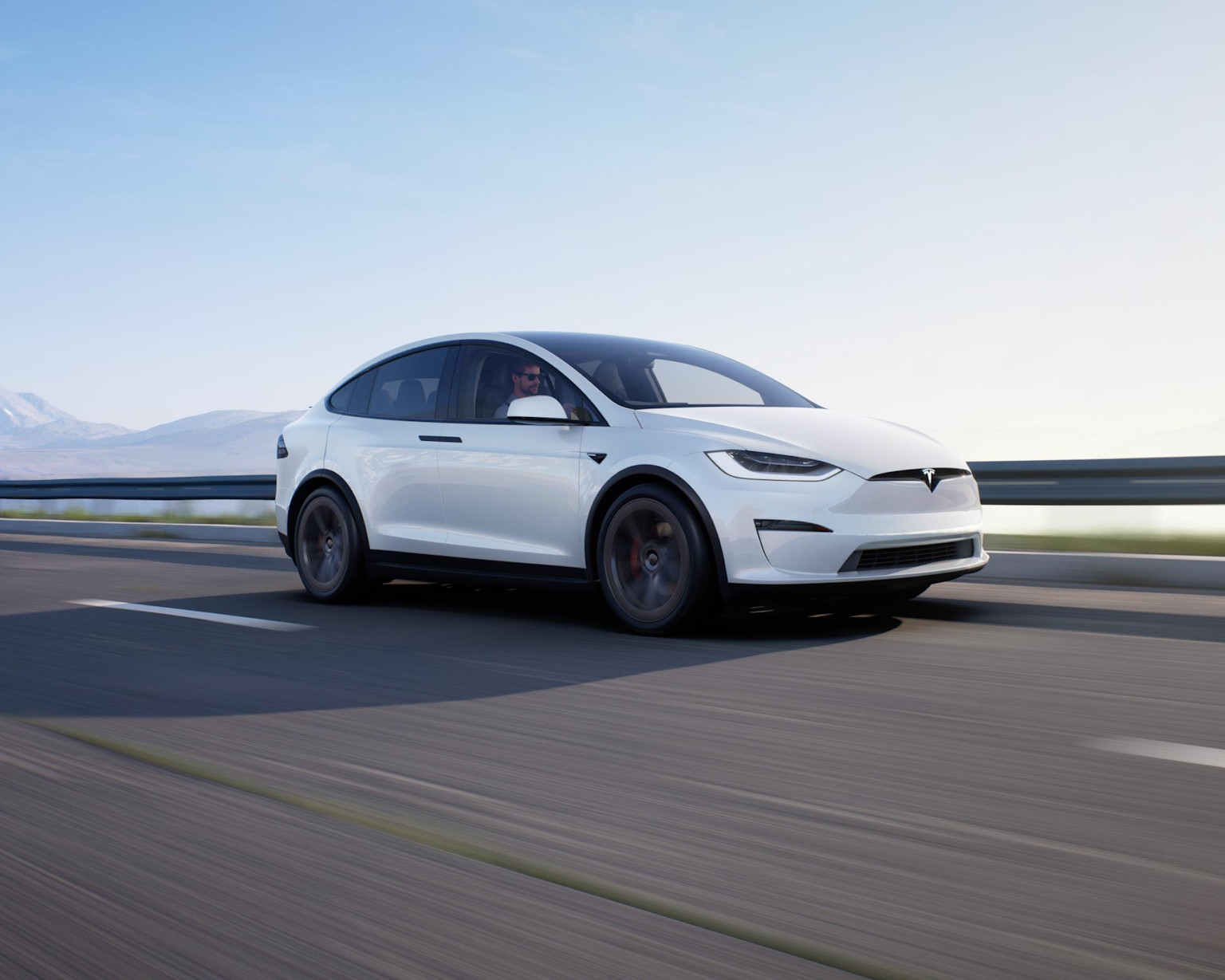 A white Tesla Model X Performance 