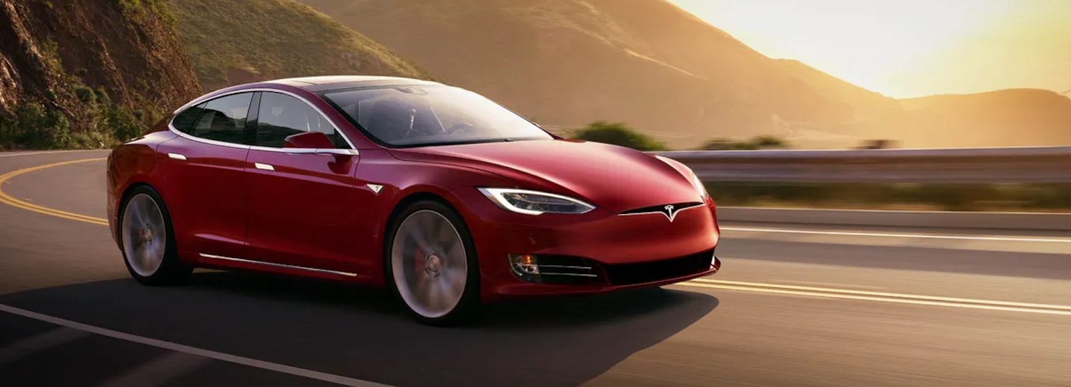 photo of a red tesla model s electric vehicle
